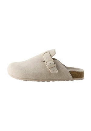 Next
Mules - stone