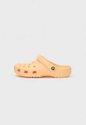 Crocs
CLASSIC UNISEX - Sandales - golden hour