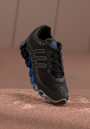 adidas Originals
MEGARIDE UNISEX - Baskets basses - core black/iron-coloured metallic/team royal blue