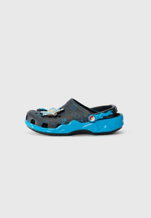 Crocs
POKEMON VERSUS - Mules - multi