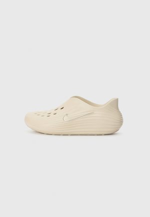 Nike Sportswear
REACT REJUVEN UNISEX - Sabots - beige
