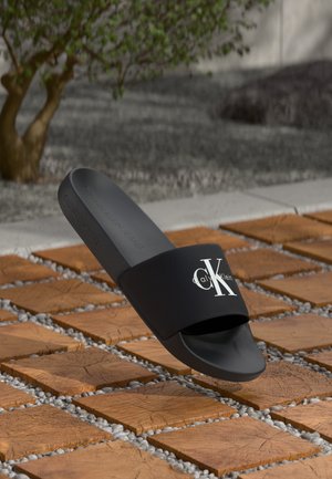 Calvin Klein Jeans
SLIDE MONOLOGO - Mules - triple black