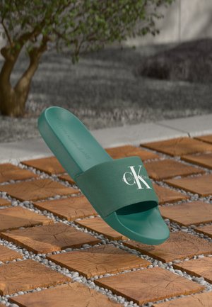 Calvin Klein Jeans
SLIDE MONOLOGO - Mules - wild green