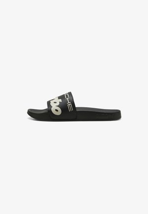 Puma
Mules - black alpine snow