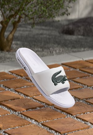 Lacoste
SERVE SLIDE DUAL - Mules - white/dark green