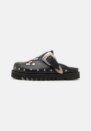 Toga
Sabots - black