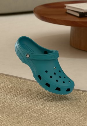 Crocs
CLASSIC UNISEX - Mules - turbo teal
