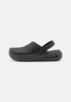 Crocs
INMOTION UNISEX - Sandales de bain - black
