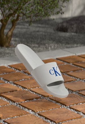 Calvin Klein Jeans
SLIDE MONO - Mules - oyster mushroom/pilgrim blue